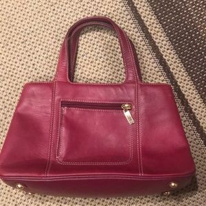 Excellent condition, includes zipped coin purse.